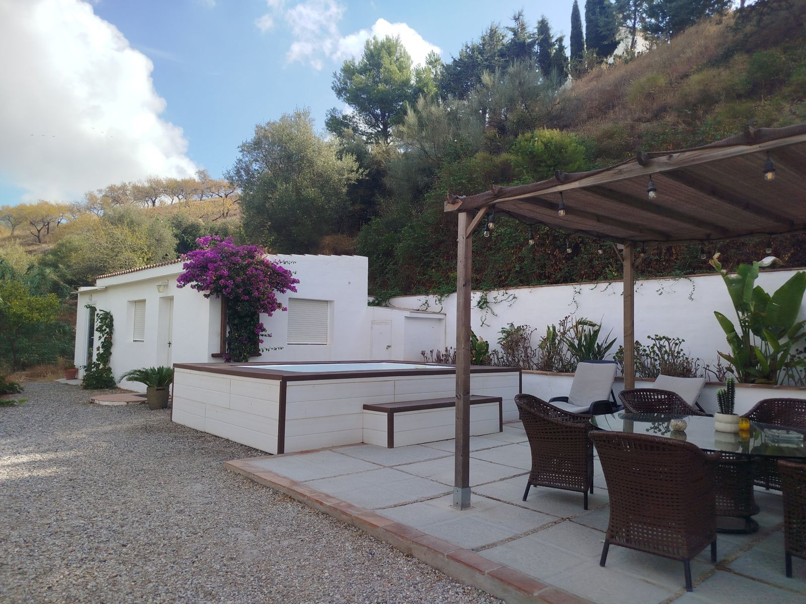 Casa Cactus with bougainvillea, its own pool and a shaded pergola terrace