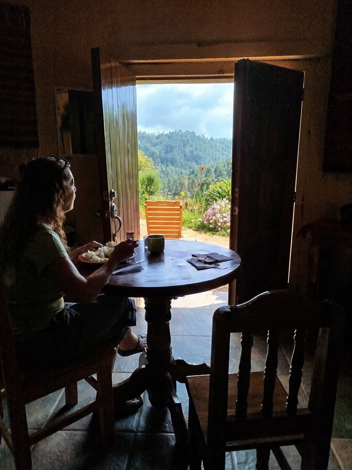 Sitting by an open door looking out at the mountains of Málaga during the retreat